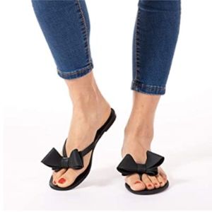Black bow flip flop sandal used